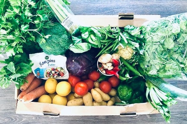 Cardboard box full of fresh veg