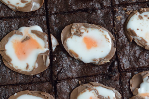Brownie slices stuffed with Creme Eggs